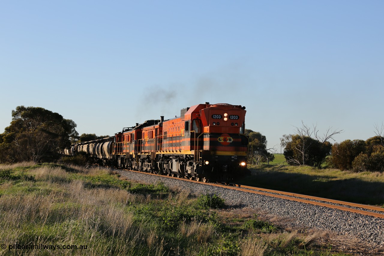 130703 0252
Kaldow, running south with the sun behind it is 1200 class 1204 a Clyde Engineering built EMD G12C model with serial 65-428 leading two ALCo units and was originally built in 1965 for Western Mining Corporation and operated by the WAGR as their A class A 1513. It came to the Eyre Peninsula in October 2004. [url=https://goo.gl/maps/FnDpXh45LbN7scrt5]Geo location[/url]. 3rd July 2013.
Keywords: 1200-class;1203;Clyde-Engineering-Granville-NSW;EMD;G12C;65-427;A-class;A1513;