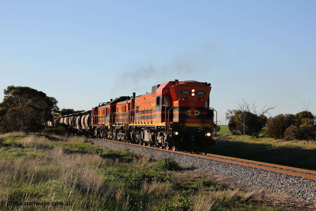 130703 0253
Kaldow, running south with the sun behind it is 1200 class 1204 a Clyde Engineering built EMD G12C model with serial 65-428 leading two ALCo units and was originally built in 1965 for Western Mining Corporation and operated by the WAGR as their A class A 1513. It came to the Eyre Peninsula in October 2004. [url=https://goo.gl/maps/FnDpXh45LbN7scrt5]Geo location[/url]. 3rd July 2013.
Keywords: 1200-class;1203;Clyde-Engineering-Granville-NSW;EMD;G12C;65-427;A-class;A1513;