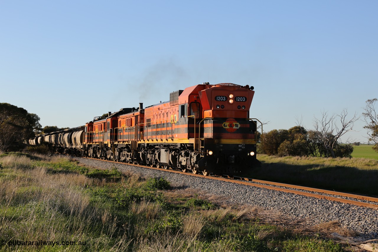 130703 0255
Kaldow, running south with the sun behind it is 1200 class 1204 a Clyde Engineering built EMD G12C model with serial 65-428 leading two ALCo units and was originally built in 1965 for Western Mining Corporation and operated by the WAGR as their A class A 1513. It came to the Eyre Peninsula in October 2004. [url=https://goo.gl/maps/FnDpXh45LbN7scrt5]Geo location[/url]. 3rd July 2013.
Keywords: 1200-class;1203;Clyde-Engineering-Granville-NSW;EMD;G12C;65-427;A-class;A1513;