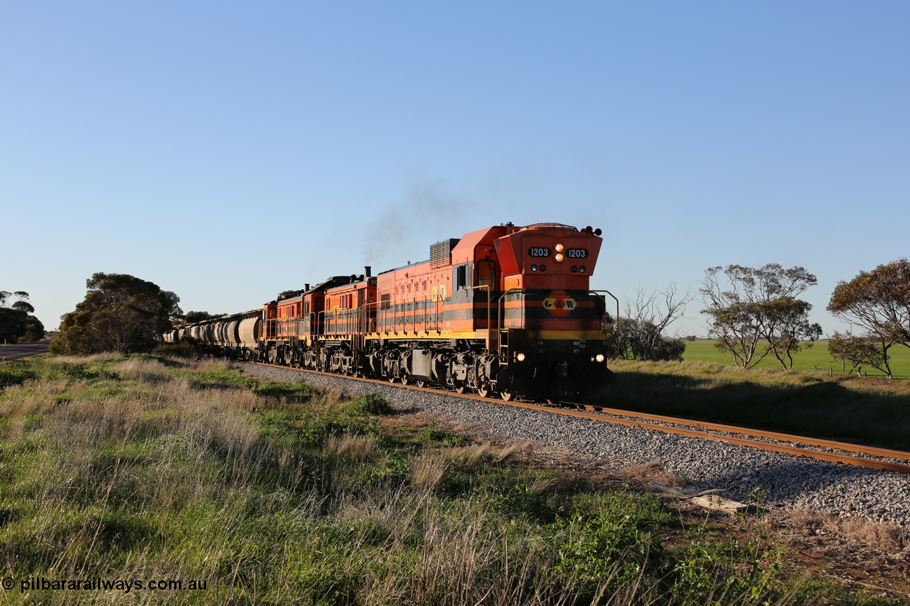 130703 0256
Kaldow, running south with the sun behind it is 1200 class 1204 a Clyde Engineering built EMD G12C model with serial 65-428 leading two ALCo units and was originally built in 1965 for Western Mining Corporation and operated by the WAGR as their A class A 1513. It came to the Eyre Peninsula in October 2004. [url=https://goo.gl/maps/FnDpXh45LbN7scrt5]Geo location[/url]. 3rd July 2013.
Keywords: 1200-class;1203;Clyde-Engineering-Granville-NSW;EMD;G12C;65-427;A-class;A1513;