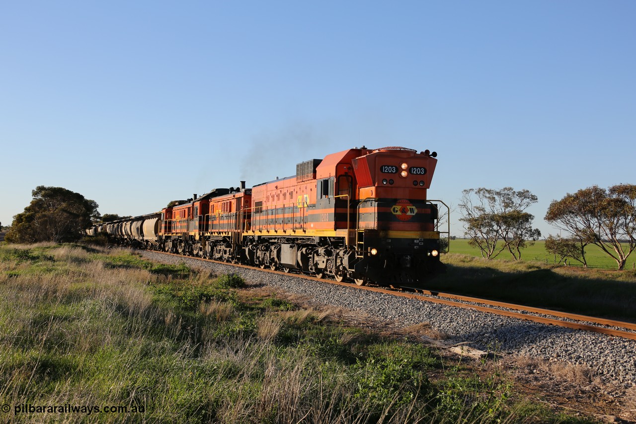 130703 0257
Kaldow, running south with the sun behind it is 1200 class 1204 a Clyde Engineering built EMD G12C model with serial 65-428 leading two ALCo units and was originally built in 1965 for Western Mining Corporation and operated by the WAGR as their A class A 1513. It came to the Eyre Peninsula in October 2004. [url=https://goo.gl/maps/FnDpXh45LbN7scrt5]Geo location[/url]. 3rd July 2013.
Keywords: 1200-class;1203;Clyde-Engineering-Granville-NSW;EMD;G12C;65-427;A-class;A1513;