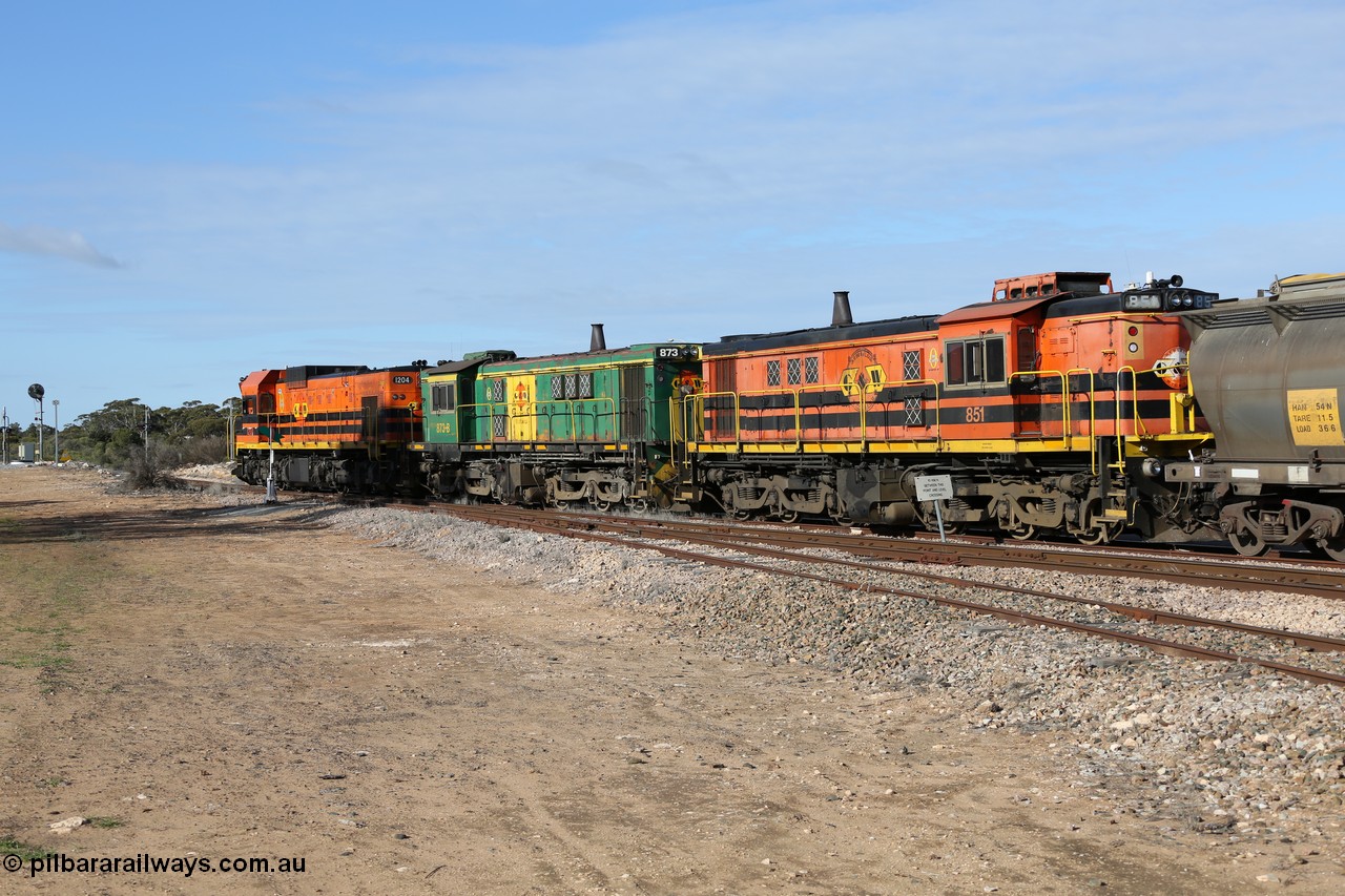 130704 0384
Kyancutta, south bound loaded grain train has stopped here to collect a loaded rack of grain waggons, seen here running out of the 'new grain siding' added in 1970 behind EMD 1204 and twin ALCo 830 units 873 and 851. 4th July 2013.
Keywords: 830-class;851;AE-Goodwin;ALCo;DL531;84137;