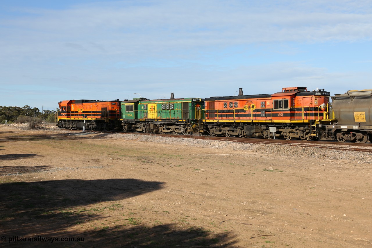 130704 0387
Kyancutta, south bound loaded grain train has stopped here to collect a loaded rack of grain waggons, seen here running out of the 'new grain siding' added in 1970 behind EMD 1204 and twin ALCo 830 units 873 and 851. 4th July 2013.
Keywords: 830-class;851;AE-Goodwin;ALCo;DL531;84137;