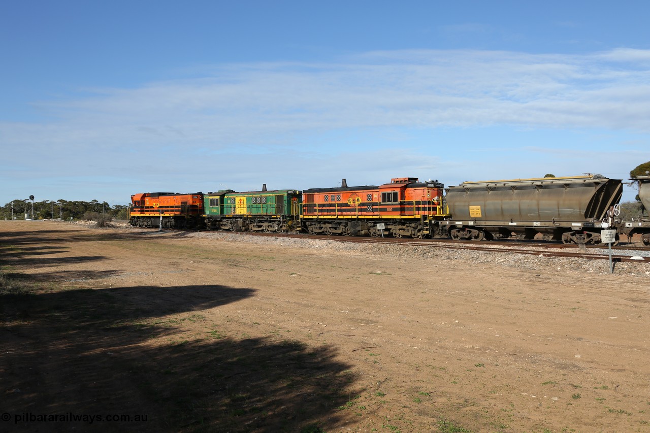 130704 0388
Kyancutta, south bound loaded grain train has stopped here to collect a loaded rack of grain waggons, seen here running out of the 'new grain siding' added in 1970 behind EMD 1204 and twin ALCo 830 units 873 and 851. 4th July 2013.
Keywords: 830-class;851;AE-Goodwin;ALCo;DL531;84137;