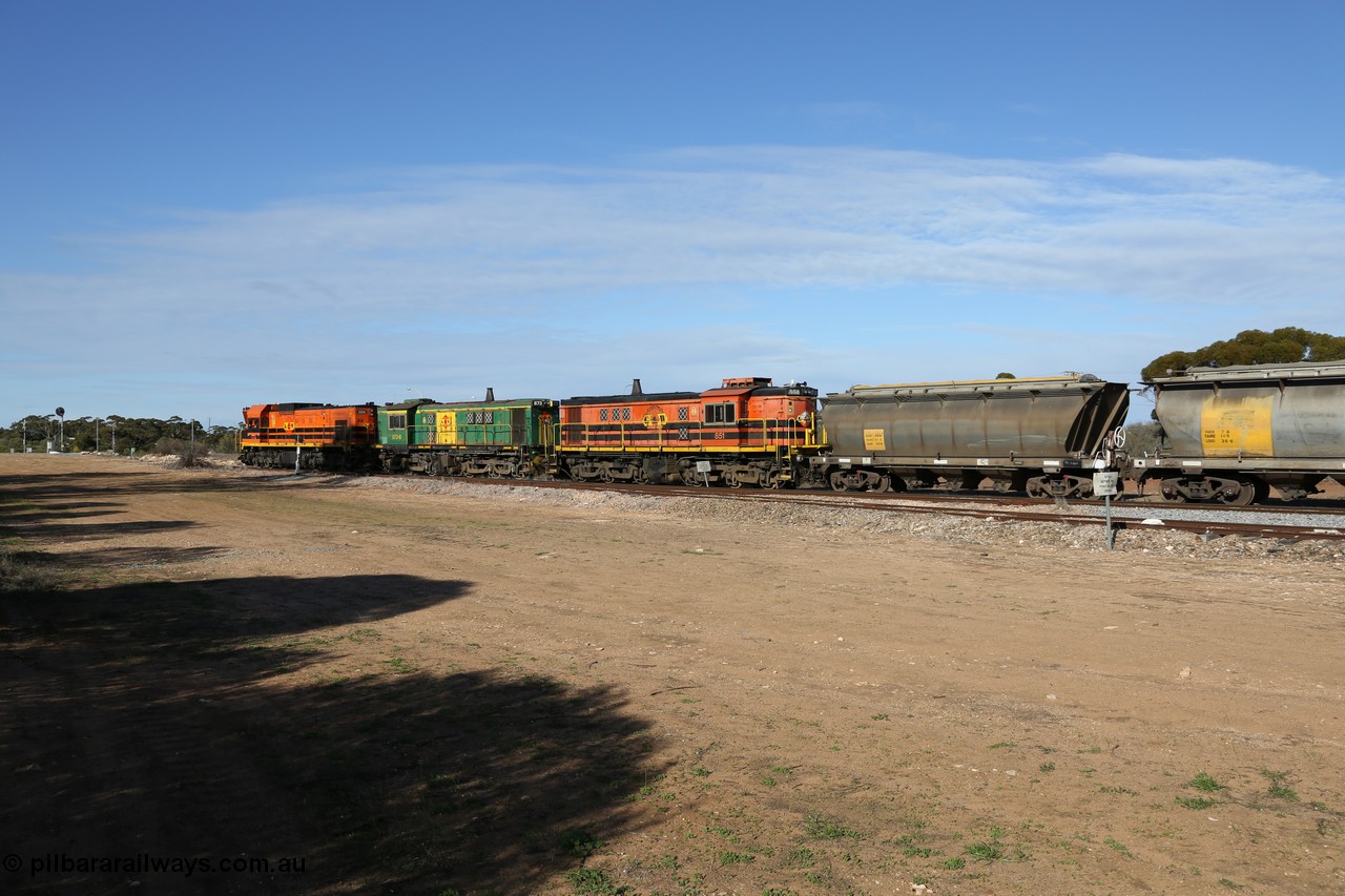 130704 0389
Kyancutta, south bound loaded grain train has stopped here to collect a loaded rack of grain waggons, seen here running out of the 'new grain siding' added in 1970 behind EMD 1204 and twin ALCo 830 units 873 and 851. 4th July 2013.
Keywords: 830-class;851;AE-Goodwin;ALCo;DL531;84137;