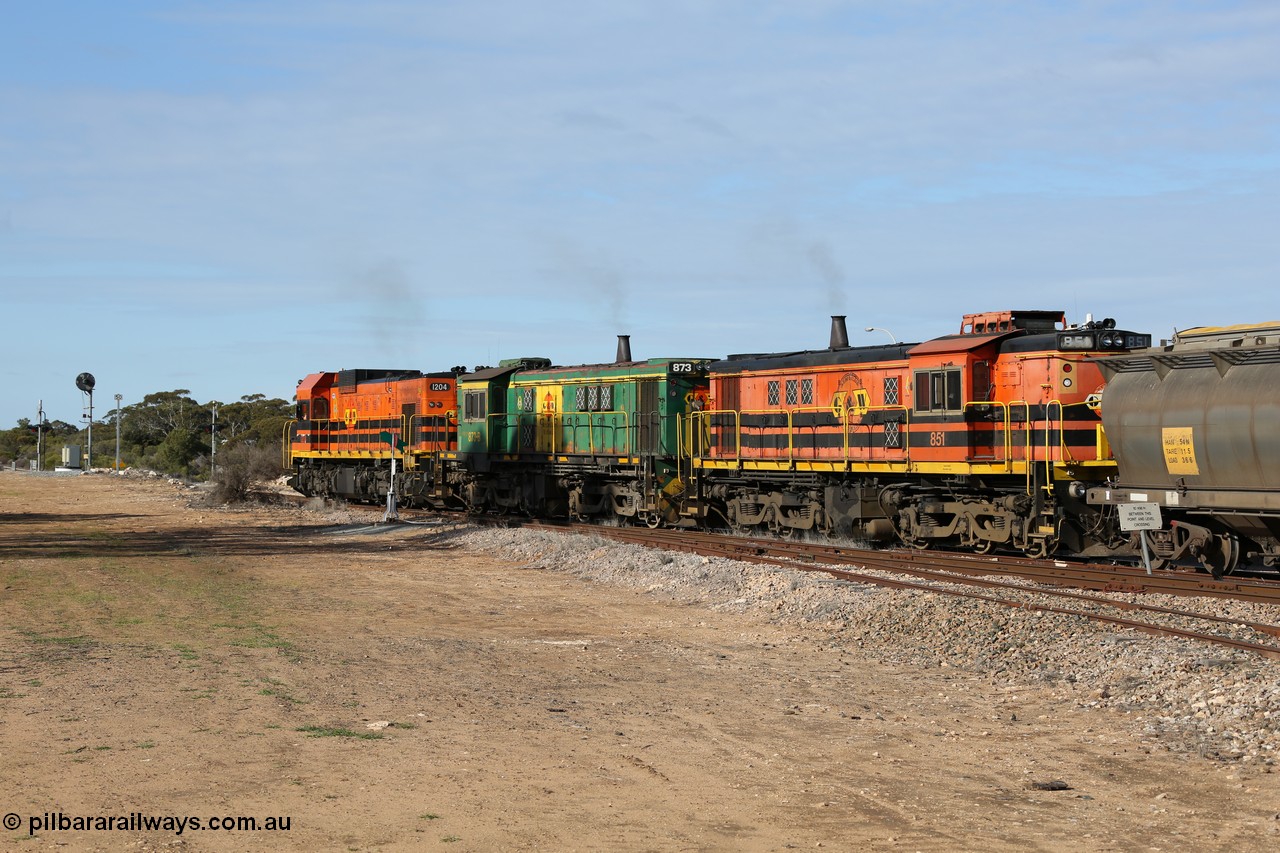 130704 0393
Kyancutta, south bound loaded grain train has stopped here to collect a loaded rack of grain waggons, seen here running out of the 'new grain siding' added in 1970 behind EMD 1204 and twin ALCo 830 units 873 and 851. 4th July 2013.
Keywords: 830-class;851;AE-Goodwin;ALCo;DL531;84137;