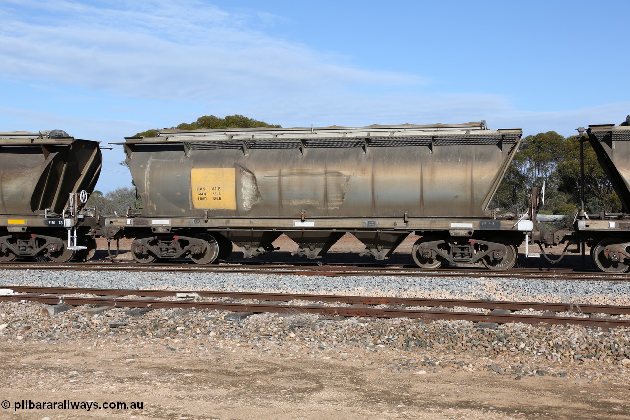 130704 0395
Kyancutta, HAN type bogie grain hopper waggon HAN 41, one of sixty eight units built by South Australian Railways Islington Workshops between 1969 and 1973 as the HAN type for the Eyre Peninsula system.
Keywords: HAN-type;HAN41;1969-73/68-41;SAR-Islington-WS;