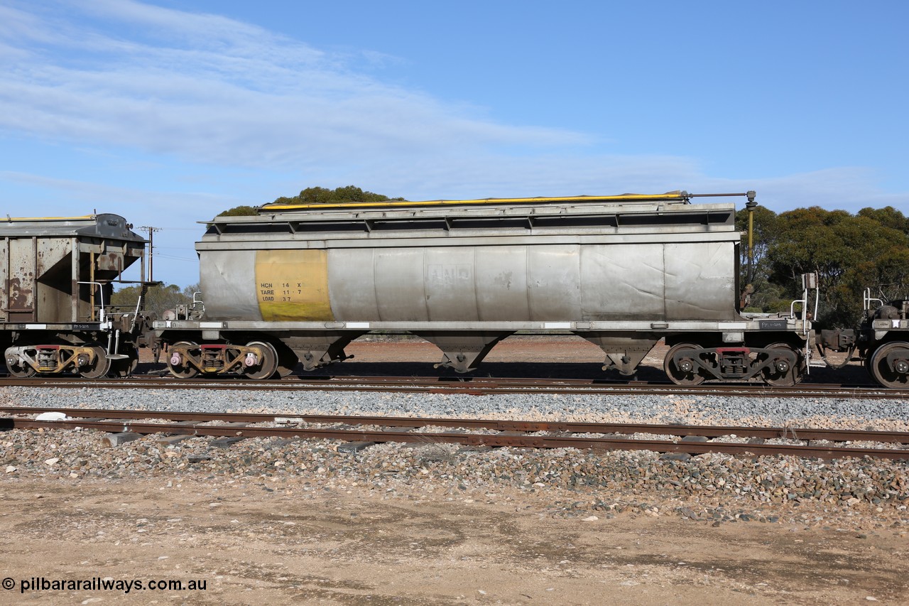 130704 0399
Kyancutta, HCN type bogie grain hopper waggon HCN 14, originally an NHB type hopper built by Tulloch Ltd for the Commonwealth Railways North Australia Railway. One of forty rebuilt by Islington Workshops 1978-79 to the HCN type with a 36 ton rating, increased to 40 tonnes in 1984. Seen here loaded with grain with a Moose Metalworks roll-top cover.
Keywords: HCN-type;HCN14;SAR-Islington-WS;rebuild;Tulloch-Ltd-NSW;NHB-type;NHB1597;