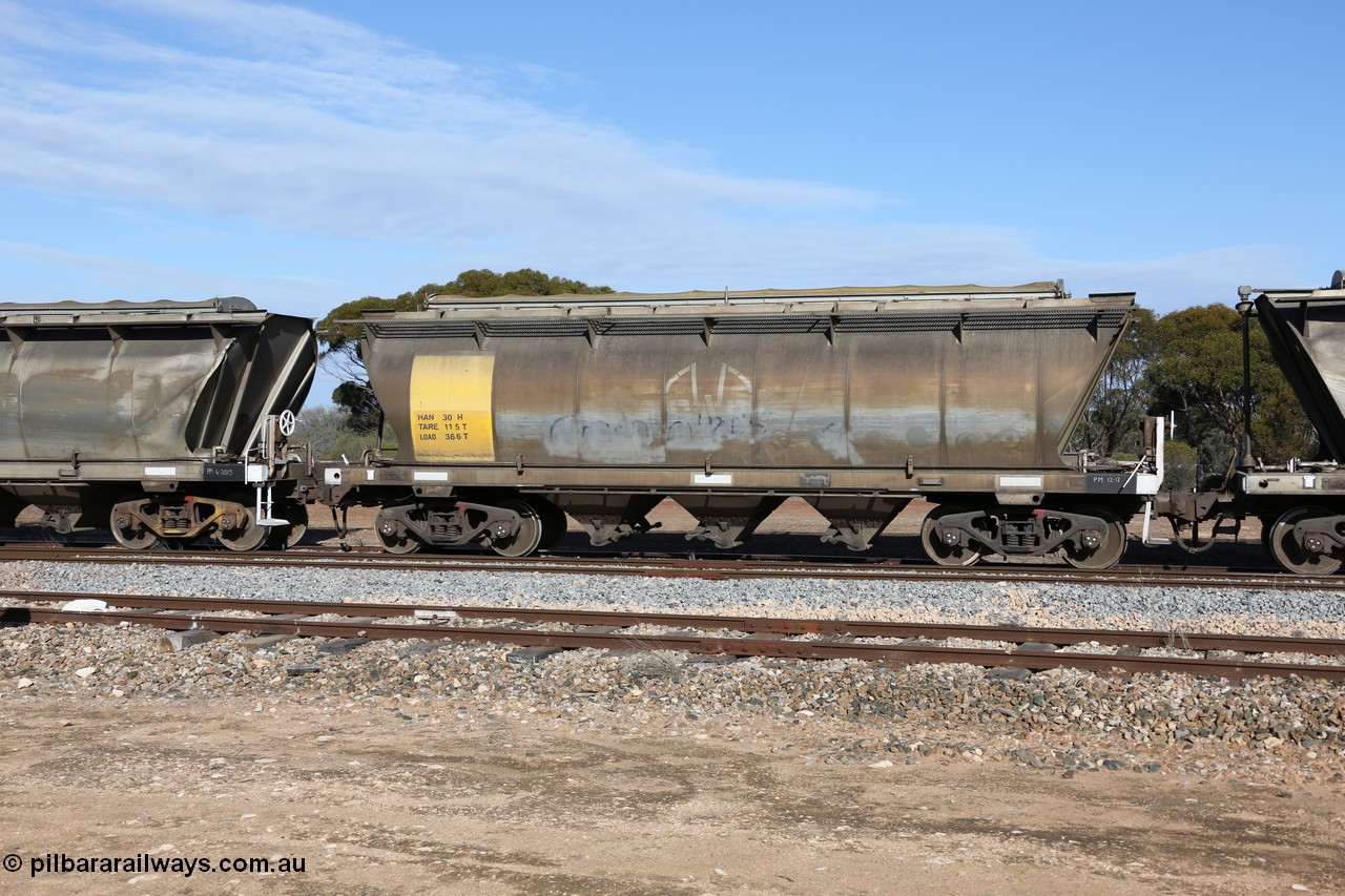 130704 0403
Kyancutta, HAN type bogie grain hopper waggon HAN 30, one of sixty eight units built by South Australian Railways Islington Workshops between 1969 and 1973 as the HAN type for the Eyre Peninsula system.
Keywords: HAN-type;HAN30;1969-73/68-30;SAR-Islington-WS;