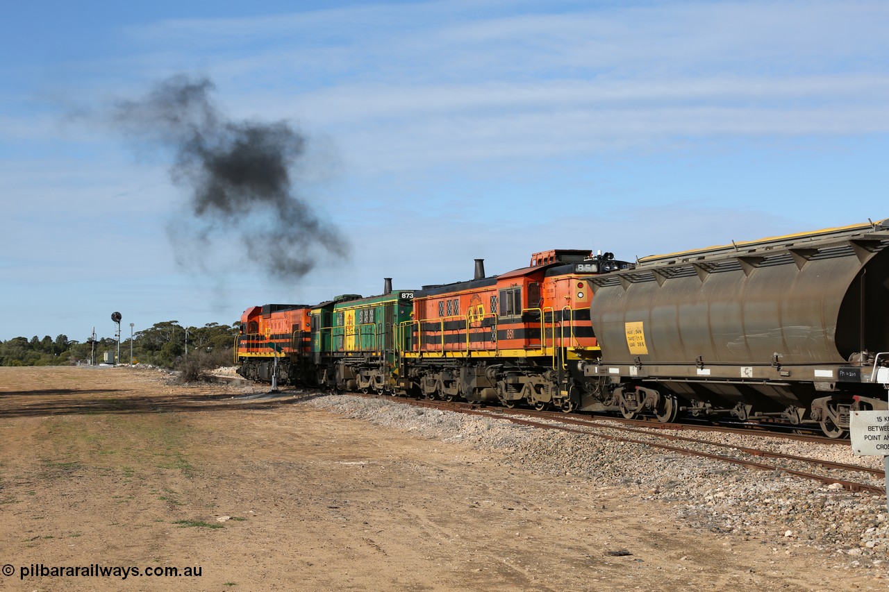 130704 0420
Kyancutta, south bound loaded grain train has stopped here to collect a loaded rack of grain waggons, seen here backing up to re-join the rest of the train on the mainline with one of only three electric signals on the network, behind EMD 1204 and twin ALCo 830 units 873 and 851. 4th July 2013.
Keywords: 830-class;851;AE-Goodwin;ALCo;DL531;84137;
