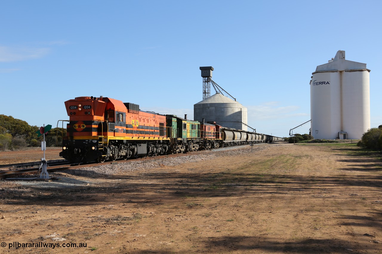 130704 0434
Kyancutta, 1200 class unit 1204 wearing current owner Genesee & Wyoming livery is a Clyde Engineering built EMD G12C model with serial 65-428 heads up a loaded grain train as it undertakes a brake test following shunting to attach a further fourteen waggons. 4th July 2013.
Keywords: 1200-class;1204;Clyde-Engineering-Granville-NSW;EMD;G12C;65-428;A-class;A1514;