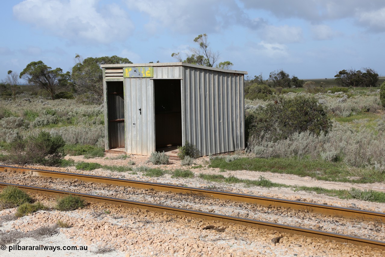 130704 0486
Moule, Mallee style shelter shed as a station 'building' of sorts. Moule was opened in February 1966 when the Direct Line between Ceduna and Kevin was opened. It hosts a crossing loop and ballast loading siding, [url=https://goo.gl/maps/KTtpy7LJB4tmHaTt6]Location is here[/url]. 4th July 2013.
