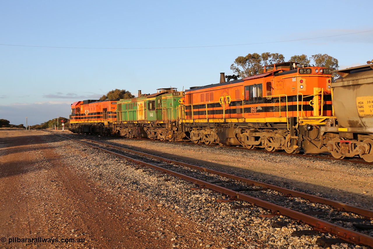 130705 0522
Lock, 1203, 846 and 859 shunt their loading grain train out of the siding onto the mainline. Genesee & Wyoming locomotive AE Goodwin ALCo model DL531 unit 859 'City of Port Lincoln' serial 84705, built in 1963, 859 started life at Peterborough, spent some years in Tasmania and even spent time in Perth on standard gauge in 2002 before being repainted and transferred to the Eyre Peninsula system in 2003. 5th of July 2013.
Keywords: 830-class;859;AE-Goodwin;ALCo;DL531;84705;
