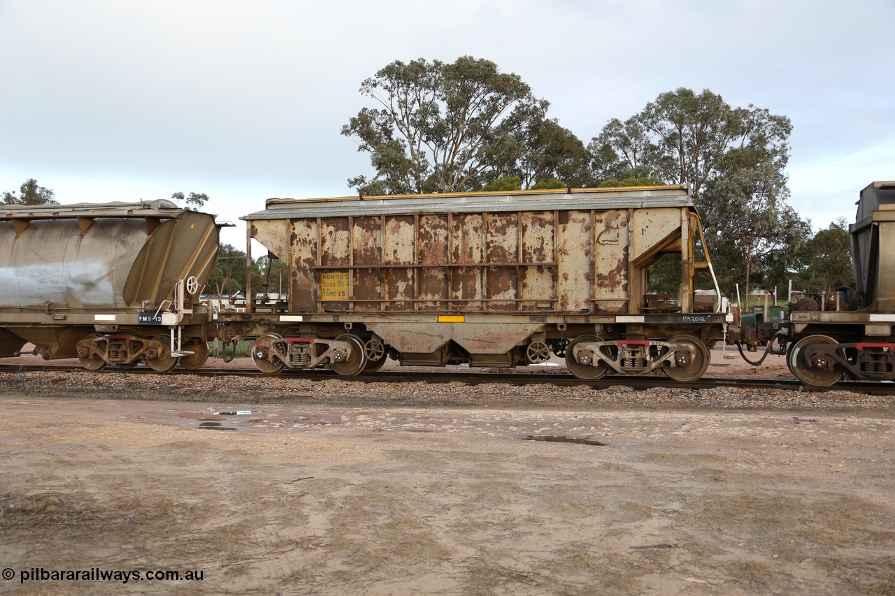 130705 0555
Lock, HBN type dual use ballast / grain hopper waggons, HBN 10 still with side gangways in place. One of seventeen built by South Australian Railways Islington Workshops in 1968 with a 25 ton capacity, increased to 34 tons in 1974. HBN 1-11 fitted with removable tops and roll-top hatches in 1999-2000. 5th July 2013.
Keywords: HBN-type;HBN10;1968/17-10;SAR-Islington-WS;