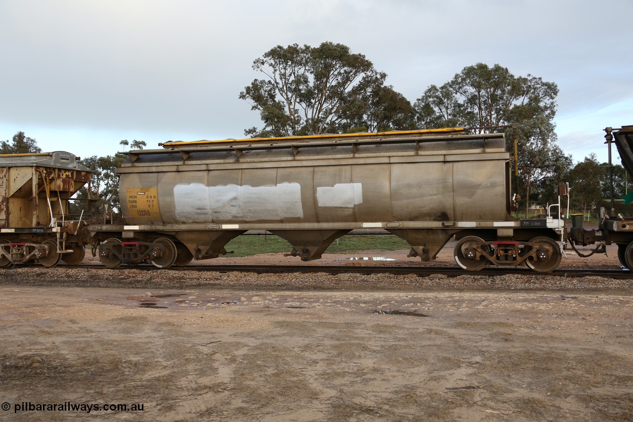 130705 0556
Lock, HCN type bogie grain hopper waggon HCN 20, originally an NHB type hopper NHB 1594 built by Tulloch Ltd for the Commonwealth Railways North Australia Railway. One of forty rebuilt by Islington Workshops 1978-79 to the HCN type with a 36 ton rating, increased to 40 tonnes in 1984. Fitted with a Moose Metalworks roll-top cover. 5th July 2013.
Keywords: HCN-type;HCN20;SAR-Islington-WS;rebuild;Tulloch-Ltd-NSW;NHB-type;NHB1594;