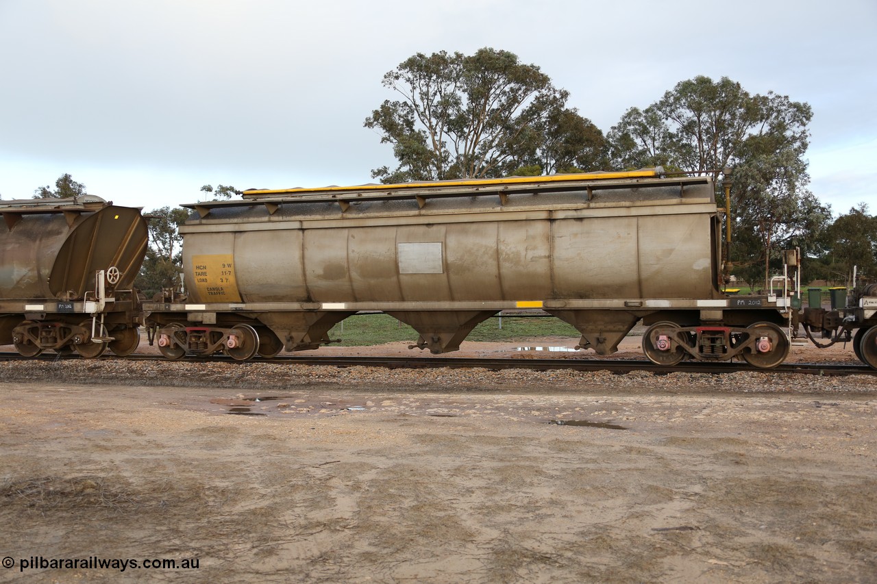 130705 0558
Lock, HCN type bogie grain hopper waggon HCN 9, originally an NHB type hopper NHB 1024 built by Tulloch Ltd for the Commonwealth Railways North Australia Railway. One of forty rebuilt by Islington Workshops 1978-79 to the HCN type with a 36 ton rating, increased to 40 tonnes in 1984. Fitted with a Moose Metalworks roll-top cover. 5th July 2013.
Keywords: HCN-type;HCN9;SAR-Islington-WS;rebuild;Tulloch-Ltd-NSW;NHB-type;NHB1024;