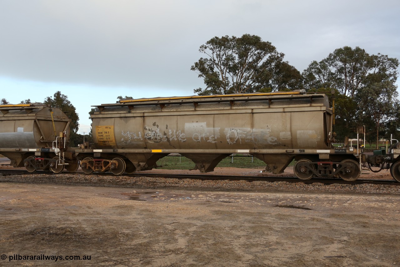 130705 0573
Lock, HCN type bogie grain hopper waggon HCN 36, originally an NHB type hopper NHB 1592 built by Tulloch Ltd for the Commonwealth Railways North Australia Railway. One of forty rebuilt by Islington Workshops 1978-79 to the HCN type with a 36 ton rating, increased to 40 tonnes in 1984. Fitted with a Moose Metalworks roll-top cover. 5th July 2013.
Keywords: HCN-type;HCN36;SAR-Islington-WS;rebuild;Tulloch-Ltd-NSW;NHB-type;NHB1592;