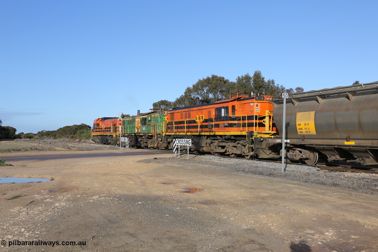 130705 0625
Lock, with loading finished, 1203 leads 846, 859 and the final portion out along the mainline out of goods siding #1 as it prepares to shunt back onto the loaded portion on the mainline for departure to Port Lincoln.
Keywords: 830-class;859;AE-Goodwin;ALCo;DL531;84705;