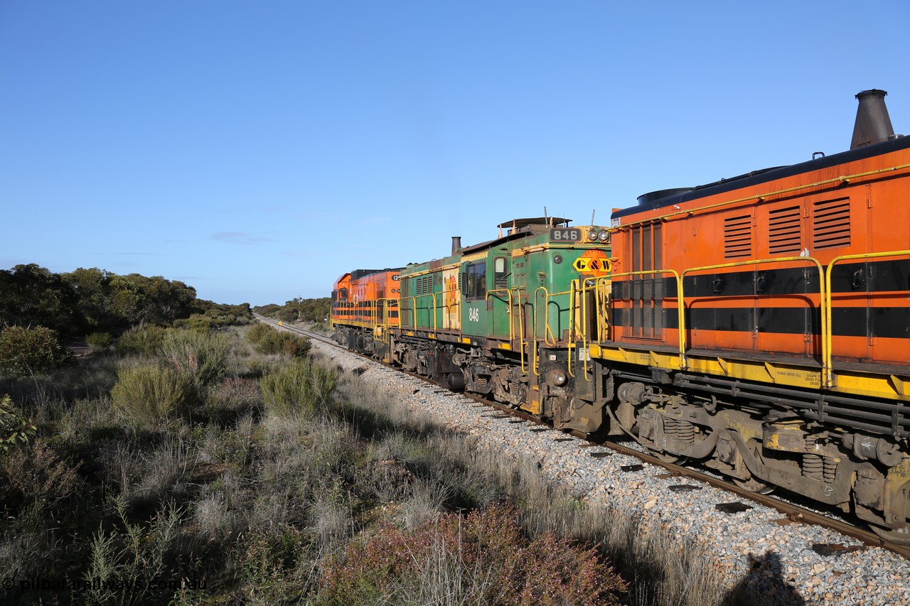 130705 0657
Lock, 1203, 846 and 859 depart along the mainline for Port Lincoln with the loaded grain train.
