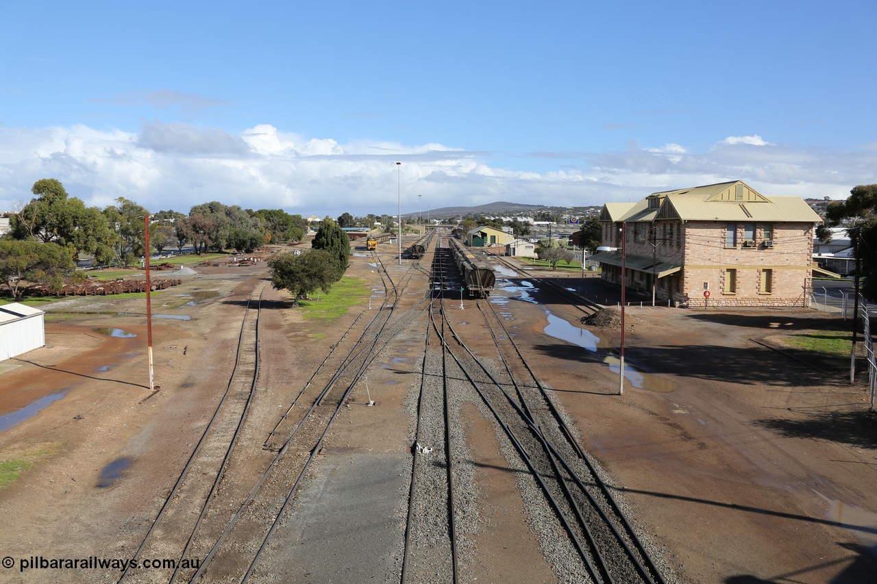 130706 0666
Port Lincoln, looking in the down direction from the London Street overbridge at the yard environs with the station at right which was Eyre Peninsula 'head offices'. 6th of July 2013.
