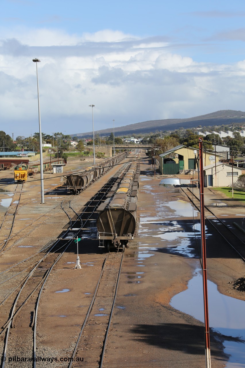 130706 0671
Port Lincoln, looking in the down direction from the London Street overbridge at the yard environs with the station at right which was Eyre Peninsula 'head offices'. 6th of July 2013.
