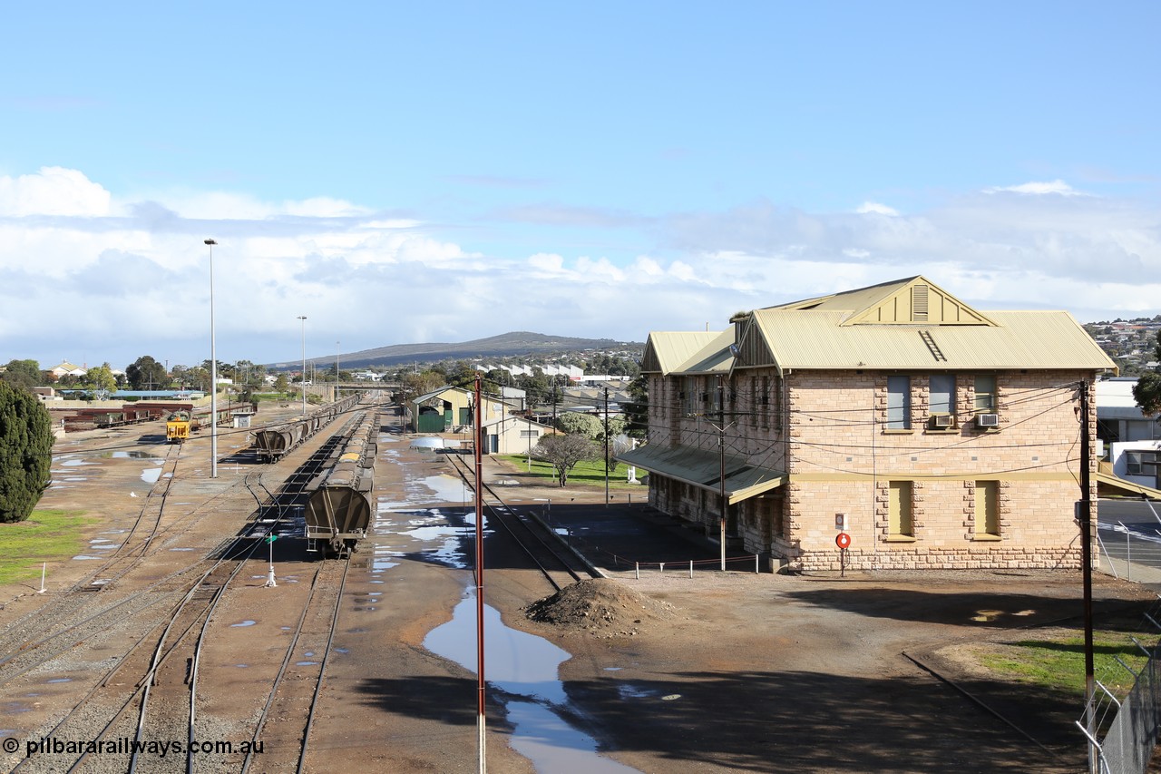 130706 0674
Port Lincoln, looking in the down direction from the London Street overbridge at the yard environs with the station at right which was Eyre Peninsula 'head offices'. 6th of July 2013.
