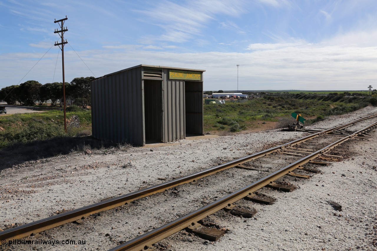 130708 0706
Penong Junction, location opened in February 1966, located at the 429.7 km, looking at the Mallee shelter shed - combined train control room, junction points and point indicator, Penong line curving around to the left.

