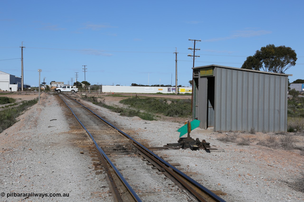 130708 0709
Penong Junction, location opened in February 1966, located at the 429.7 km, looking south from the junction points towards Ceduna and Thevenard across the grade crossing for the Eyre Highway.
