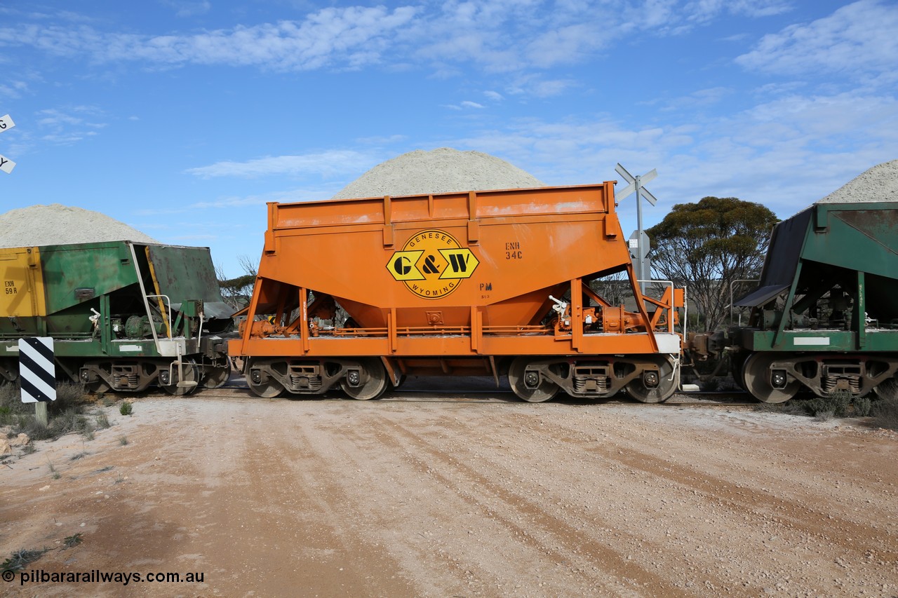 130708 0744
Charra, originally an Kinki Sharyo built NH type for the NAR now coded ENH type ENH 34, in GWA corporate orange livery of owner Genesee & Wyoming Australia, still with hungry boards loaded with gypsum, [url=https://goo.gl/maps/fnkK0]Charoban Rd grade crossing, 477.8 km[/url].
Keywords: ENH-type;ENH34;Kinki-Sharyo-Japan;NH-type;NH934;