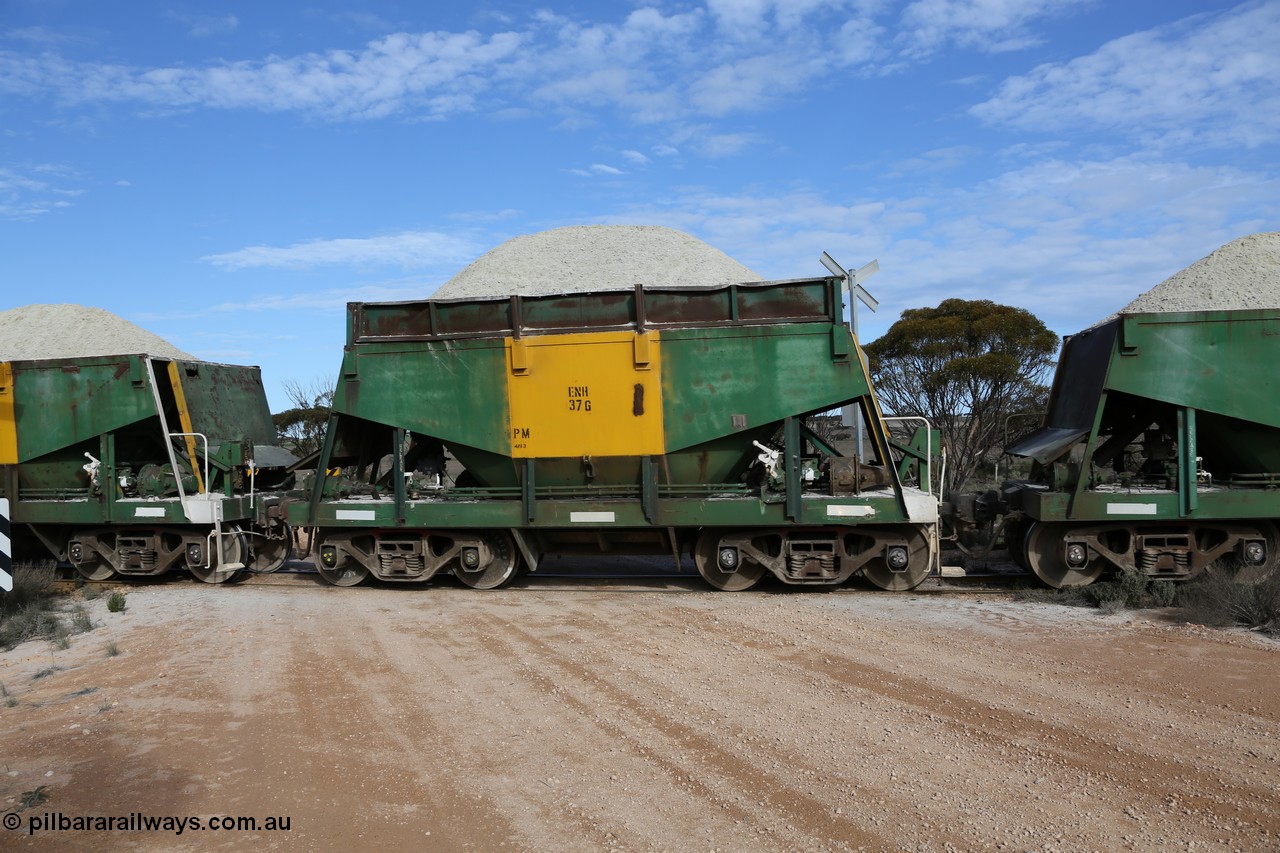 130708 0756
Charra, originally an Kinki Sharyo built NH type for the NAR now coded ENH type ENH 37 G, with hungry boards still fitted loaded with gypsum, [url=https://goo.gl/maps/fnkK0]Charoban Rd grade crossing, 477.8 km[/url].
Keywords: ENH-type;ENH37;Kinki-Sharyo-Japan;NH-type;NH937;