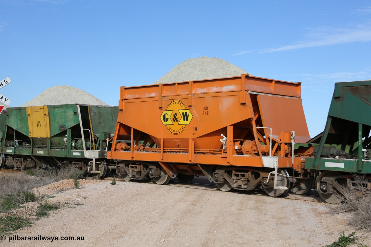 130708 0824
Moule, originally an Kinki Sharyo built NH type for the NAR now coded ENH type ENH 34, in GWA corporate orange livery of owner Genesee & Wyoming Australia, still with hungry boards loaded with gypsum, [url=https://goo.gl/maps/SWBMW]Mewett Rd grade crossing, 470.1 km[/url].
Keywords: ENH-type;ENH34;Kinki-Sharyo-Japan;NH-type;NH934;