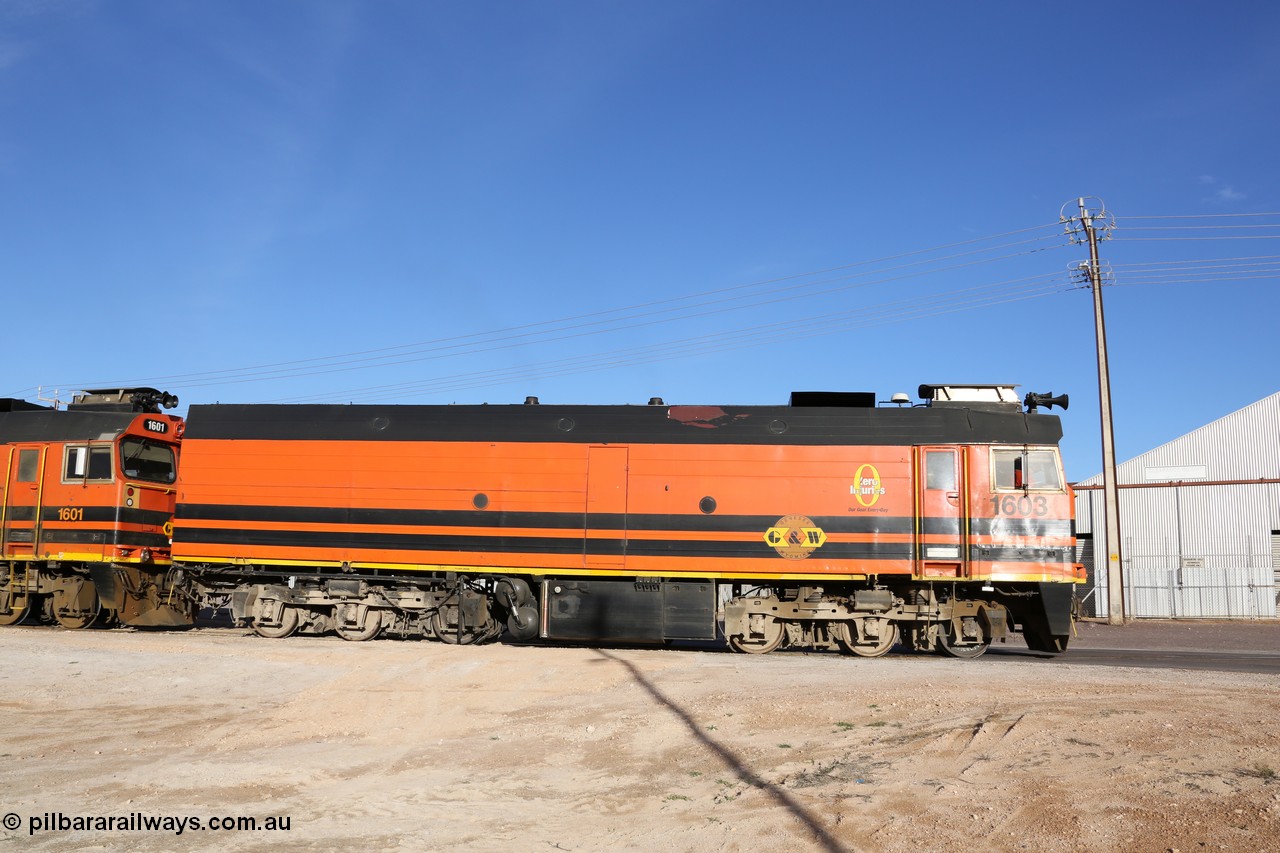 130708 0880
Thevenard, loaded train running through the back of the yard and crossing [url=https://goo.gl/maps/dgQdX]Bergmann Drive grade crossing, 434.2 km[/url].
