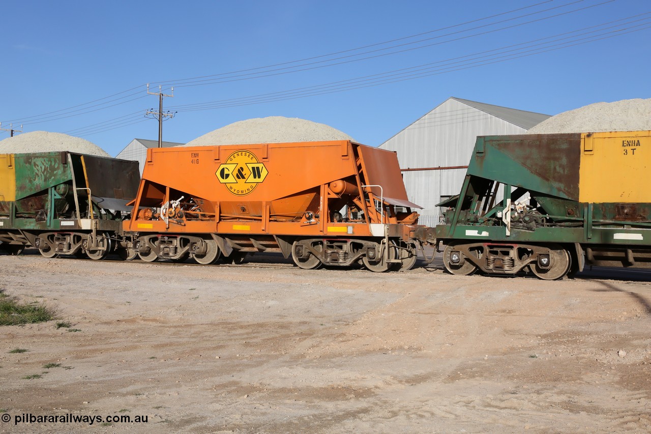 130708 0927
Thevenard originally an Kinki Sharyo built NH type for the NAR now coded ENH type ENH 41 in GWA corporate orange livery of owner Genesee & Wyoming Australia, without hungry boards loaded with gypsum crossing [url=https://goo.gl/maps/dgQdX]Bergmann Drive grade crossing, 434.2 km[/url].
Keywords: ENH-type;ENH41;Kinki-Sharyo-Japan;NH-type;NH941;