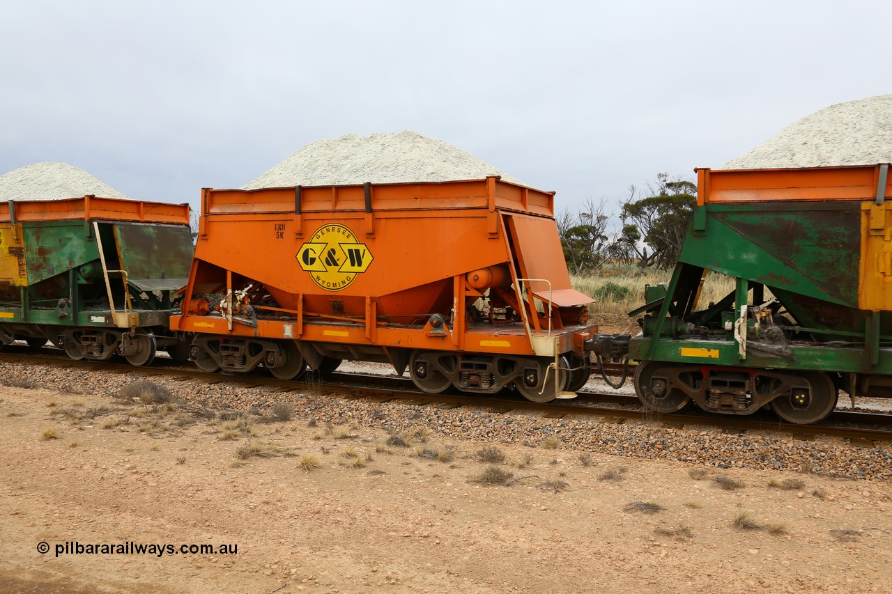 161109 1927
Moule, originally built by Kinki Sharyo as the NH type for the NAR in 1968, sent to Port Lincoln in 1978, then rebuilt and recoded ENH type in 1984, ENH 5, recently refurbished and wearing current owner Genesee & Wyoming orange and decal with matching hungry boards loaded with gypsum.
Keywords: ENH-type;ENH5;Kinki-Sharyo-Japan;NH-type;NH905;