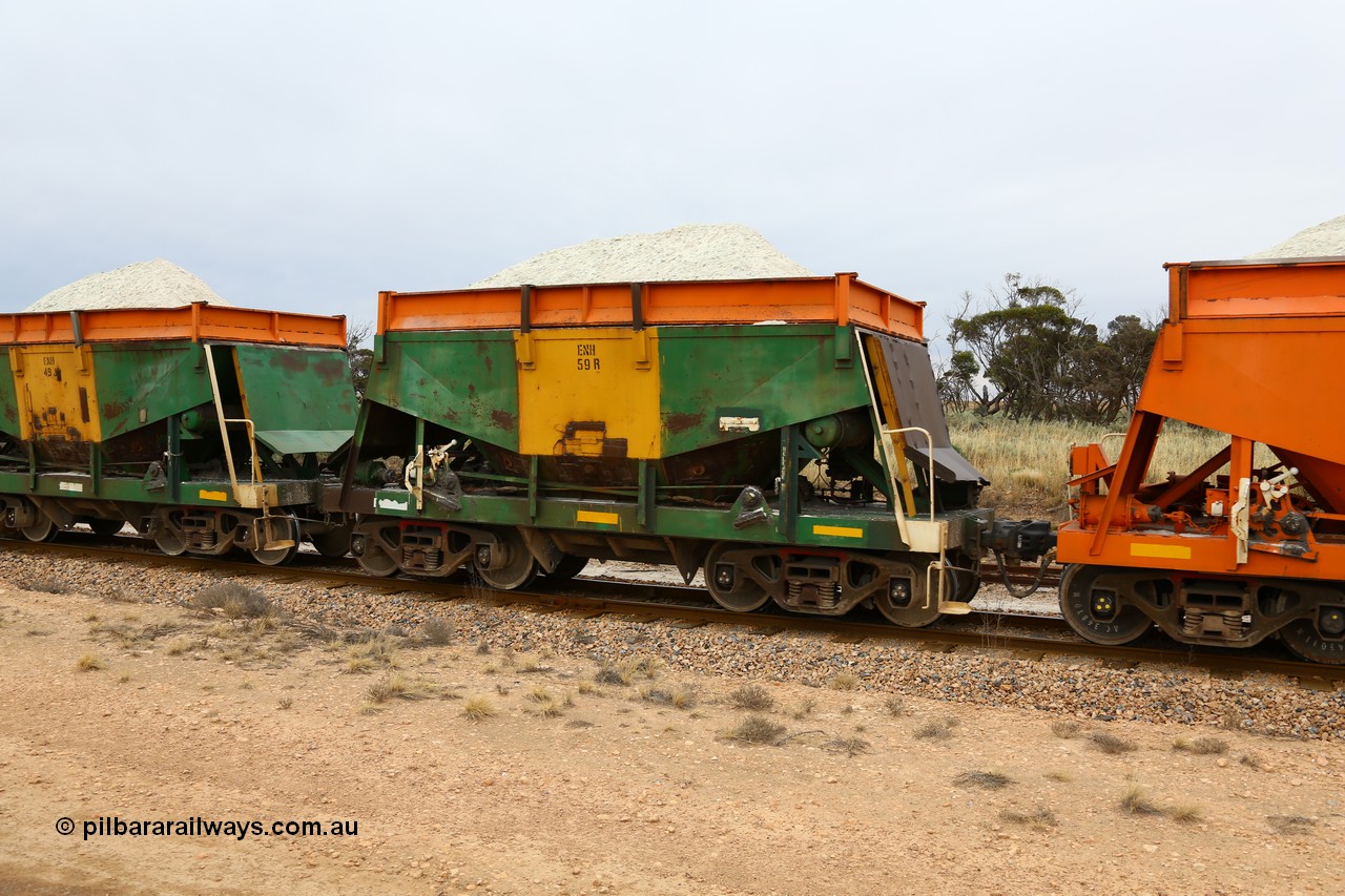 161109 1936
Moule, originally built by Kinki Sharyo as the NH type for the NAR in 1968, sent to Port Lincoln in 1978, then rebuilt and recoded ENH type in 1984, ENH 59 with hungry boards loaded with gypsum.
Keywords: ENH-type;ENH59;Kinki-Sharyo-Japan;NH-type;NH959;