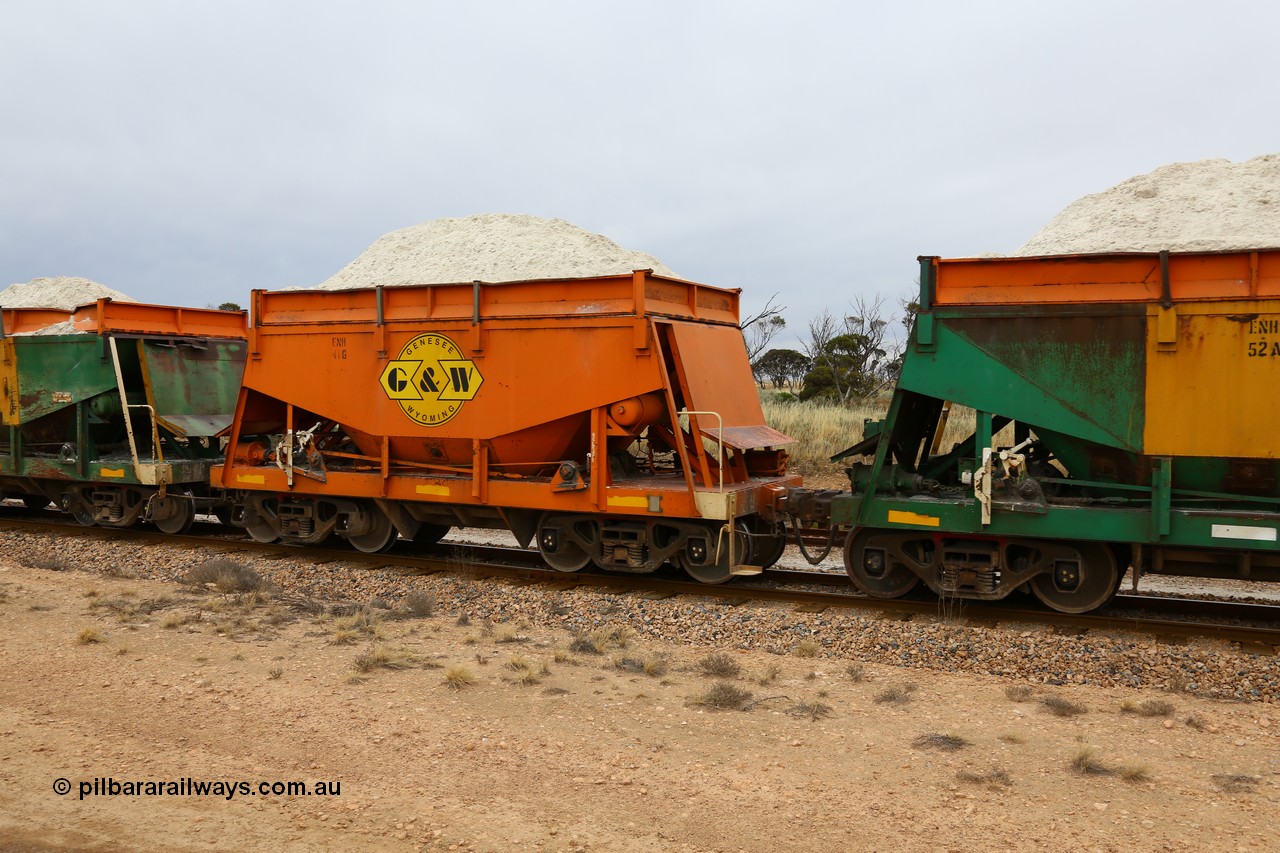 161109 1950
Moule, originally built by Kinki Sharyo as the NH type for the NAR in 1968, sent to Port Lincoln in 1978, then rebuilt and recoded ENH type in 1984, ENH 41, refurbished and wearing current owner Genesee & Wyoming orange and decal with matching hungry boards loaded with gypsum.
Keywords: ENH-type;ENH41;Kinki-Sharyo-Japan;NH-type;NH941;