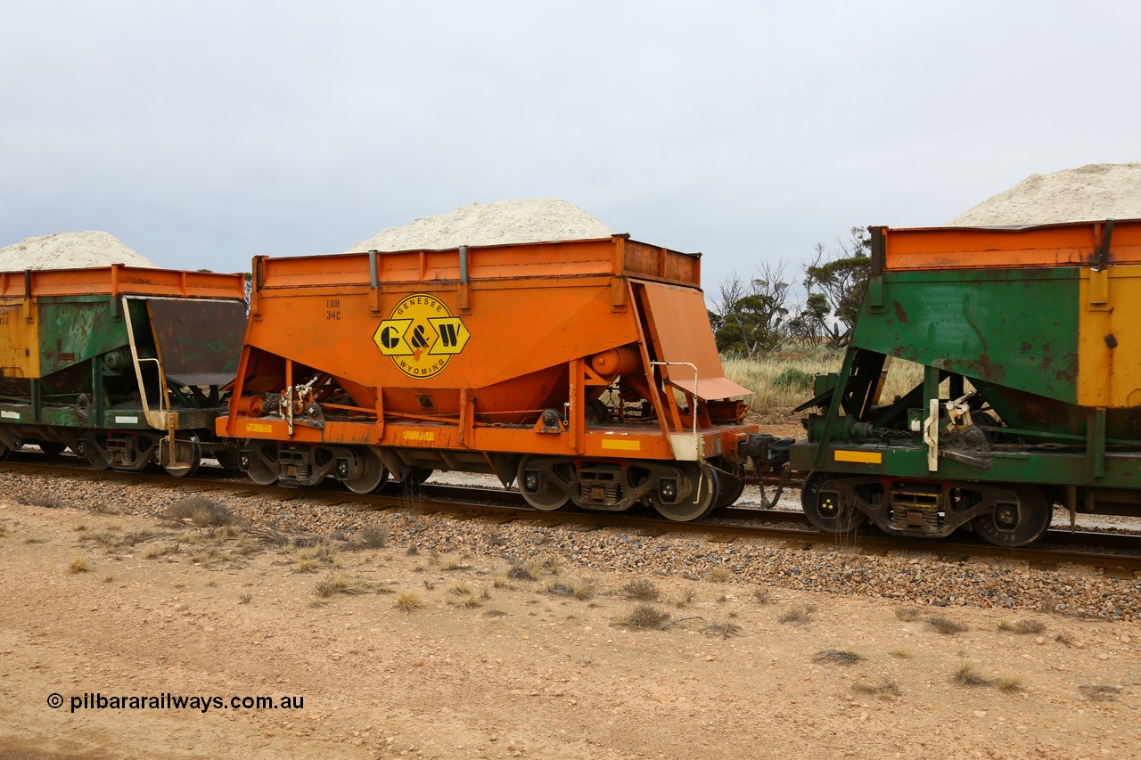 161109 1954
Moule, originally built by Kinki Sharyo as the NH type for the NAR in 1968, sent to Port Lincoln in 1978, then rebuilt and recoded ENH type in 1984, ENH 34, refurbished and wearing current owner Genesee & Wyoming orange and decal with matching hungry boards loaded with gypsum.
Keywords: ENH-type;ENH34;Kinki-Sharyo-Japan;NH-type;NH934;