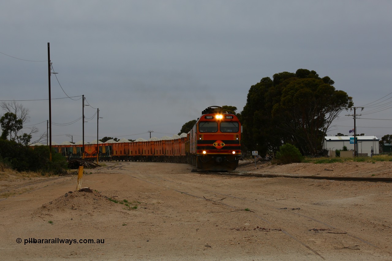 161109 1967
Thevenard, train 4DD4 enters the yard behind Genesee & Wyoming locomotives Clyde Engineering EMD model JL22C unit 1601 serial 71-728 and 1603 serial 71-730 as they negotiate the yard to the GRA siding balloon for unloading.
Keywords: 1600-class;1601;Clyde-Engineering-Granville-NSW;EMD;JL22C;71-728;NJ-class;NJ1;