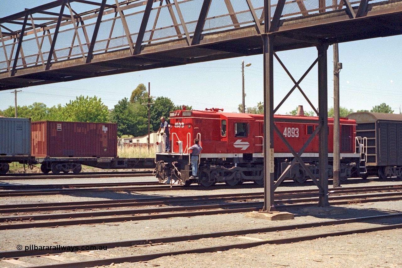 100-18
Albury yard, NSWSRA standard gauge 48 class 4893 AE Goodwin ALCo model DL531 serial G3420-8, red terror livery, shunters riding loco. [url=https://goo.gl/maps/GD6wj4qXeCg5BFzr7]Geodata[/url].
Keywords: 48-class;4893;AE-Goodwin;ALCo;DL531;G3420-8;