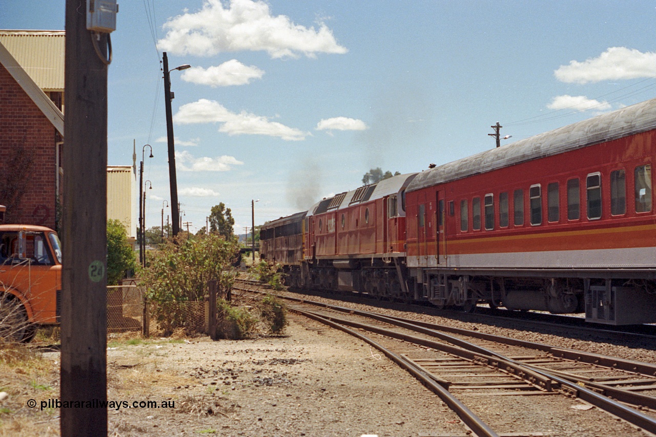 100-20
Albury yard, Wilson Street, NSWSRA standard gauge 44 class 4479 AE Goodwin ALCo model DL500B serial G3421-19 and 422 class 42205 Clyde Engineering EMD model J26C serial 69-660, candy livery, north bound Inter-Capital Daylight, trailing shot. [url=https://goo.gl/maps/GD6wj4qXeCg5BFzr7]Geodata[/url].
Keywords: 44-class;4479;AE-Goodwin;ALCo;DL500B;G3421-19;422-class;42205;Clyde-Engineering-Granville-NSW;EMD;J26C;69-660;