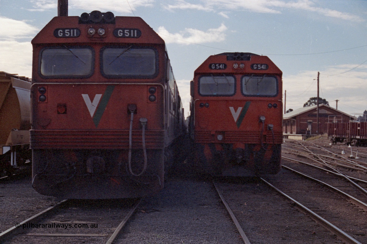 101-11
Maryborough, broad gauge V/Line G class leader G 511 Clyde Engineering EMD model JT26C-2SS serial 84-1239 and G 541 serial 89-1274 cab front, shows differences between 1st and 3rd series G class.
Keywords: G-class;G511;Clyde-Engineering-Rosewater-SA;EMD;JT26C-2SS;84-1239;G541;89-1274;