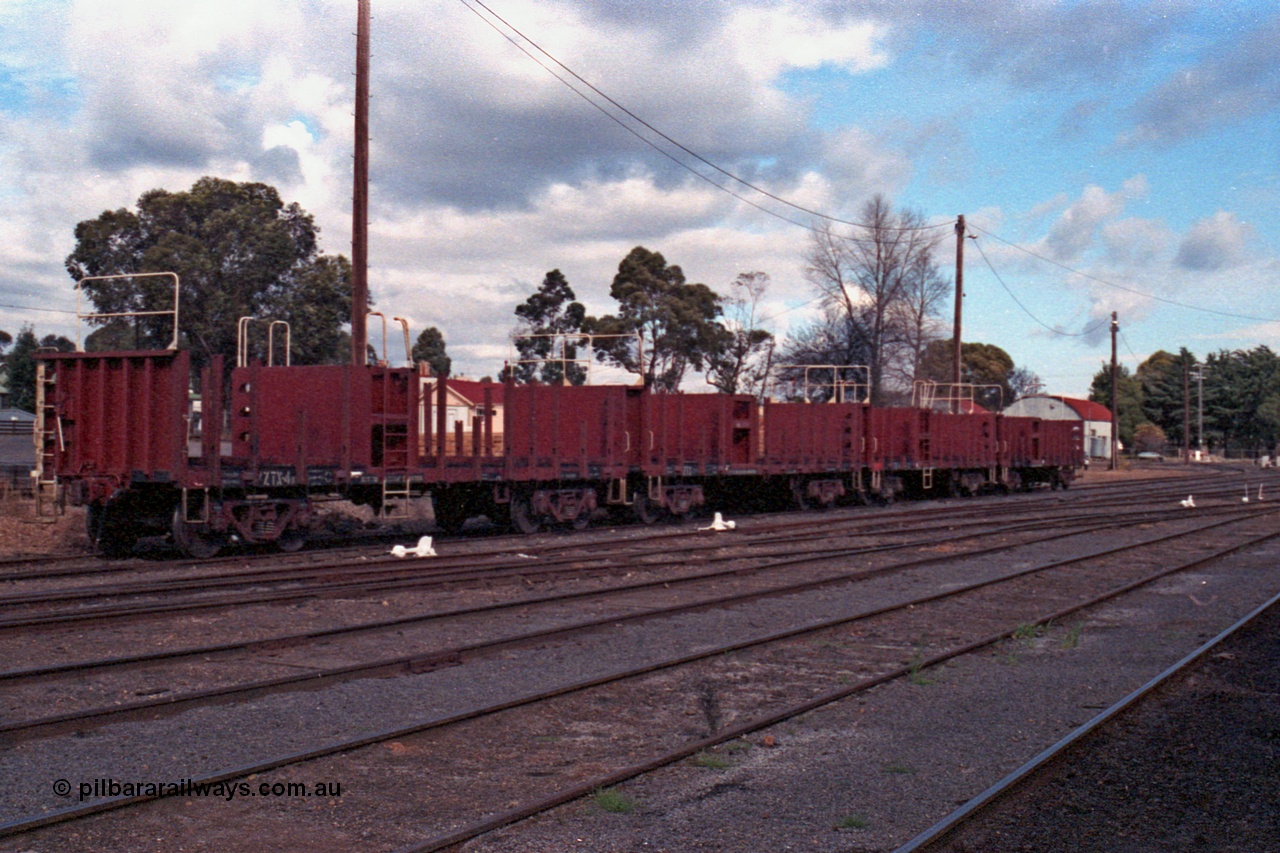 101-15
Maryborough yard view, four broad gauge V/Line VZTX type bogie manual discharge sleeper waggons VZTX 4, started out as BP type Steel Mail/Baggage Van BP 7 built in 1959 by Newport Workshops, went on to become VBAX 17 in 1979, then converted September 1988 at Bendigo Workshops to VZTX type.
Keywords: VZTX-type;VZTX4;Victorian-Railways-Newport-WS;BP-type;VBAX-type;