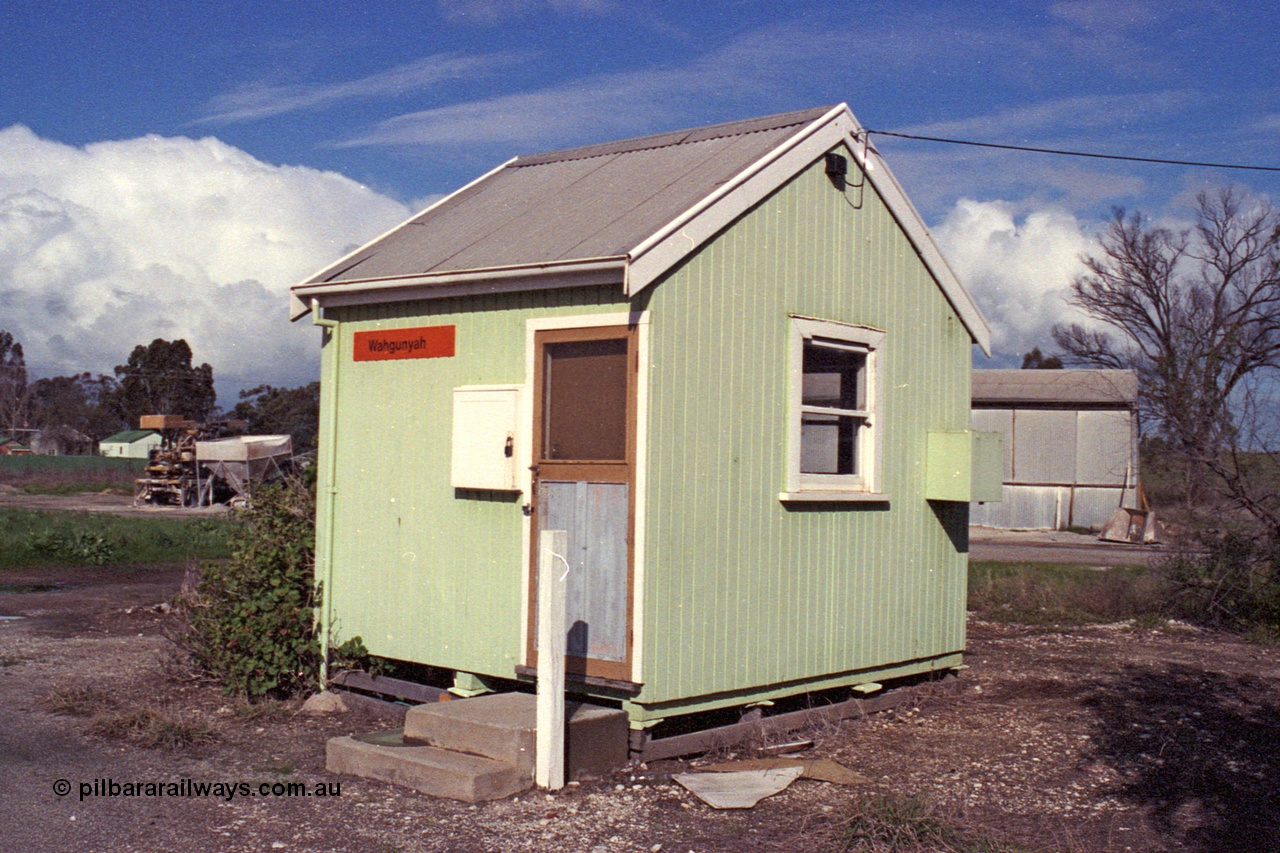 103-15
Wahgunyah portable station building, staff hut, 3/4 view, super phosphate shed and unloading contraption in the background.
