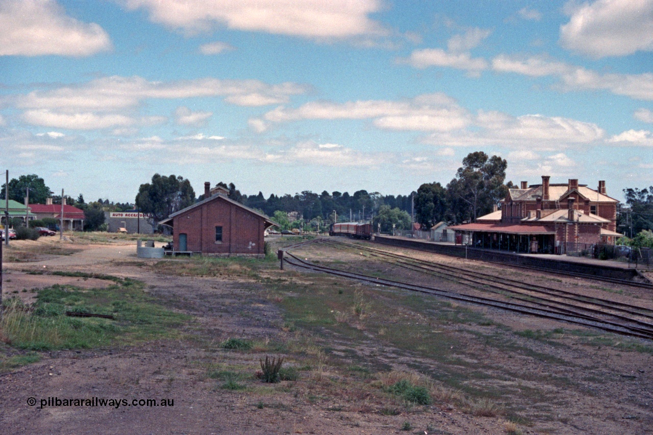 104-04
Stawell station yard overview, goods shed at left, Dimboola pass departing crossing Seaby St.

