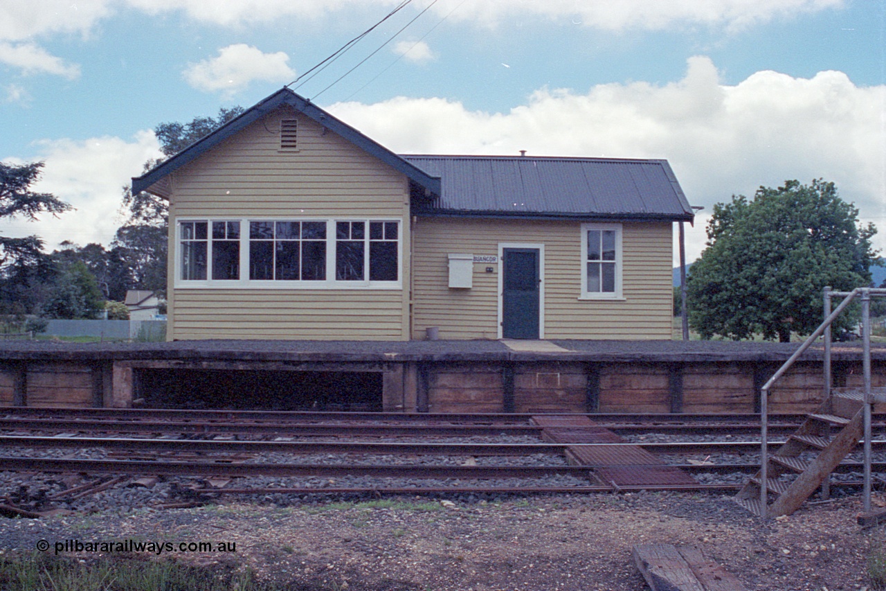 104-12
Buangor station building front elevation, signal box at left, rodding and wires leaving platform opening, staff exchange platform at right.
