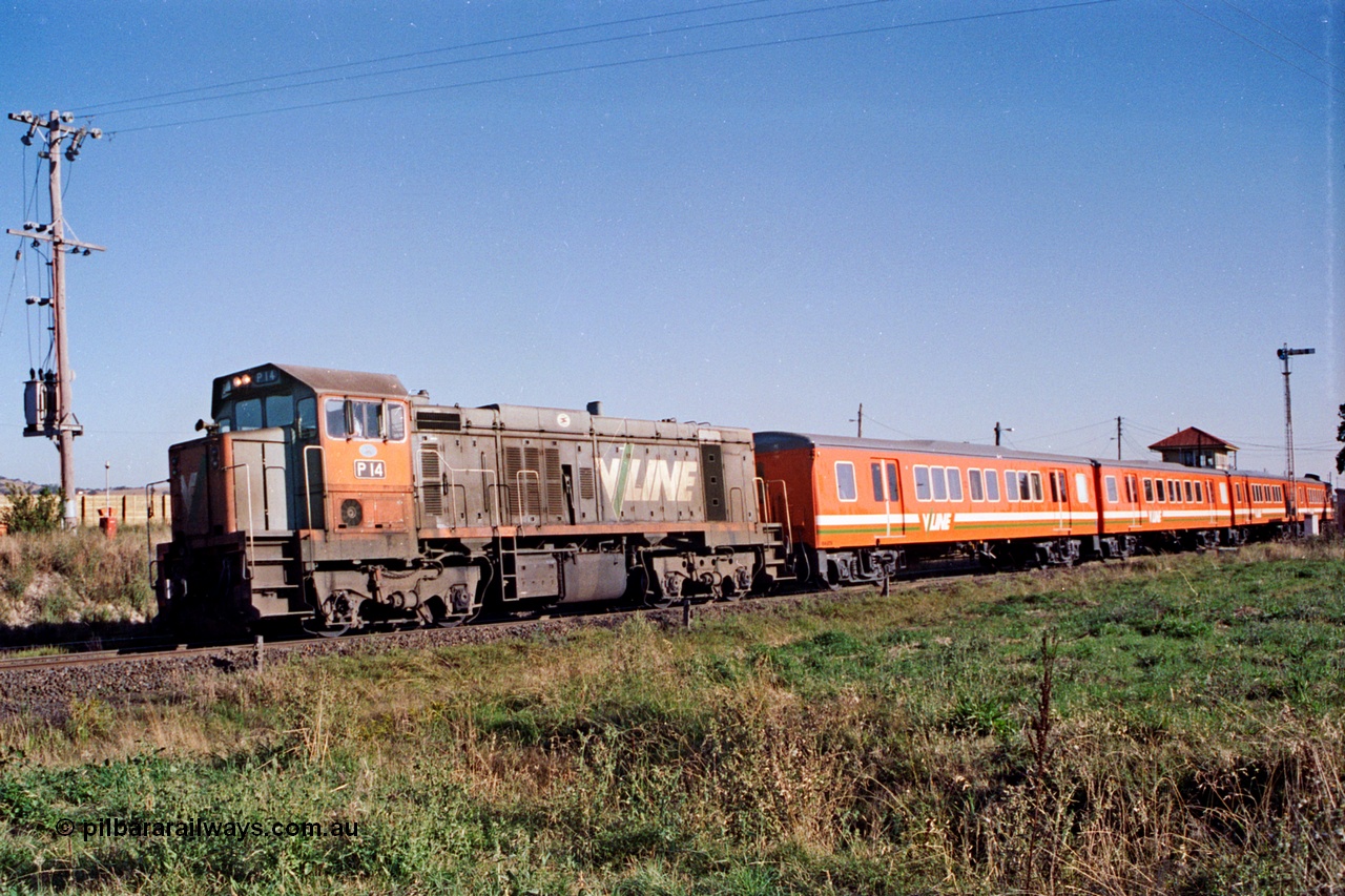 105-05
Wallan, V/Line broad gauge P class P 14 Clyde Engineering EMD model G18HBR serial 84-1208 rebuilt from T 330 Clyde Engineering EMD model G8B serial 56-85 departs with down passenger train 8323 and H set.
Keywords: P-class;P14;Clyde-Engineering-Somerton-Victoria;EMD;G18HBR;84-1208;rebuild;