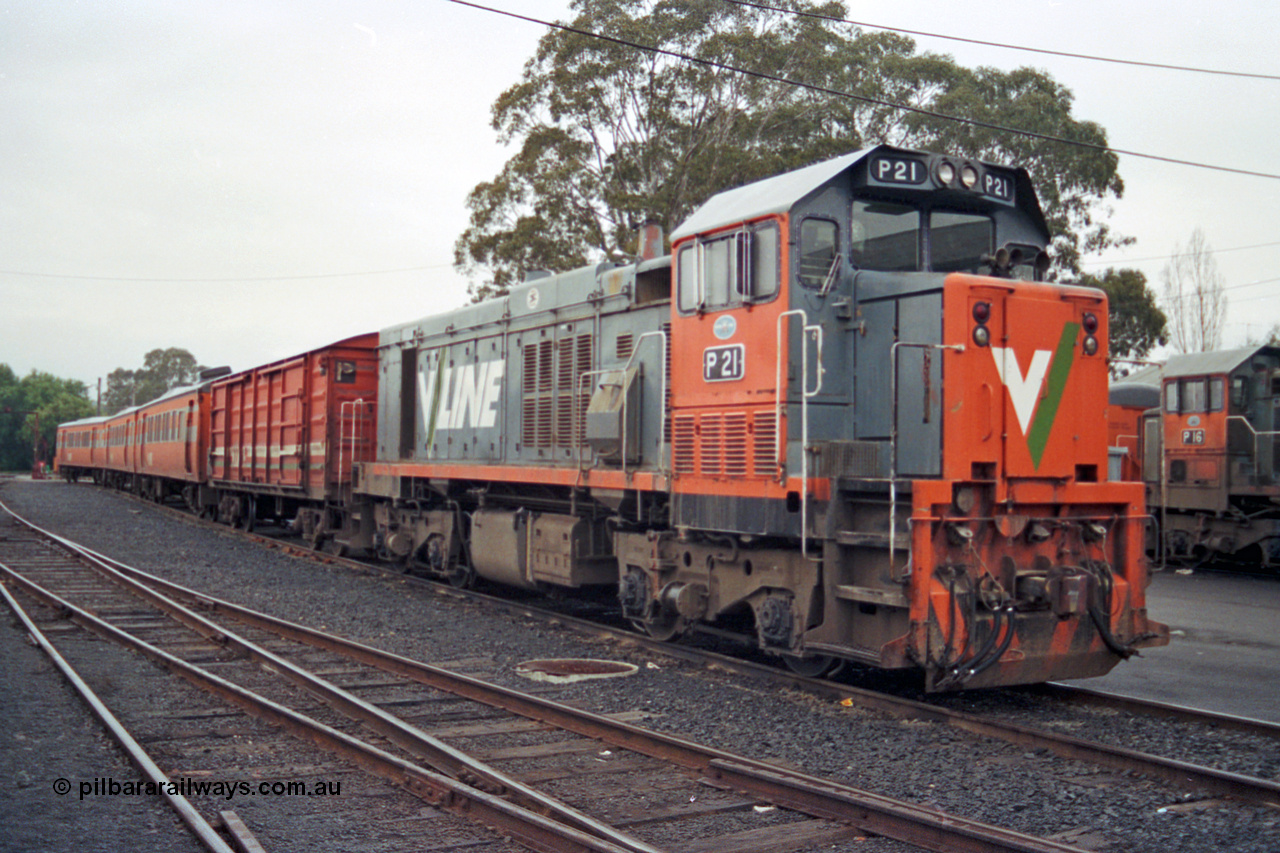 106-20
Seymour broad gauge passenger stabling yard, V/Line P class P 21 Clyde Engineering EMD model G18HBR serial 84-1214 rebuilt from flat-top T class T 338 Clyde Engineering EMD model G8B serial 56-114 with D van and orange 'Tea Cup' liveried H set SH 28.
Keywords: P-class;P21;Clyde-Engineering-Somerton-Victoria;EMD;G18HBR;84-1214;rebuild;