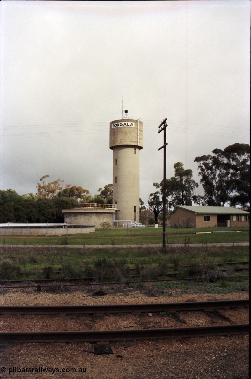 107-14
Tongala town concrete water tower and treatment plant, taken from station yard.

