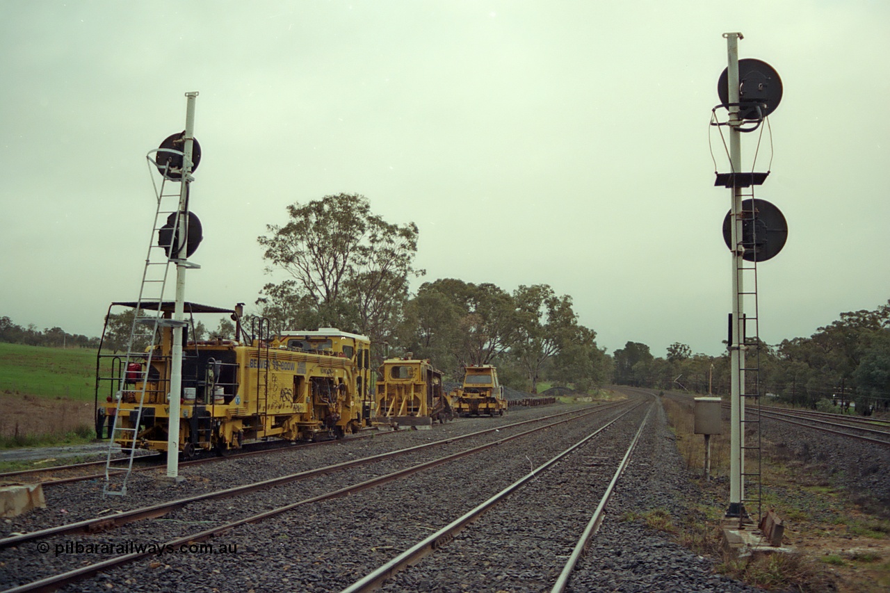 109-05
Broadford Loop, standard gauge, track machines, tamper, regulator, looking south, new signals.
Keywords: track-machine;