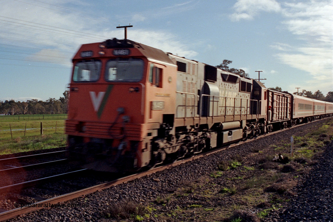 109-10
Dysart, V/Line broad gauge N class N 461 'City of Ararat' Clyde Engineering EMD model JT22HC-2 serial 86-1190 with up Albury passenger train, off focus.
Keywords: N-class;N461;Clyde-Engineering-Somerton-Victoria;EMD;JT22HC-2;86-1190;